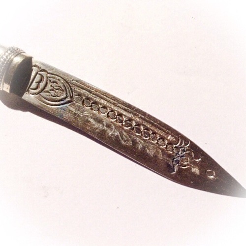 The blade is covered with sacred inscription of Sanskrit spells engraved upon the edge